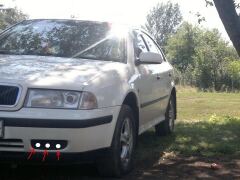 Ништяки — ништяки (эмбема от Ситиго задняя, бандана с логотипом Шкода) + светодиоды в бампер image #2